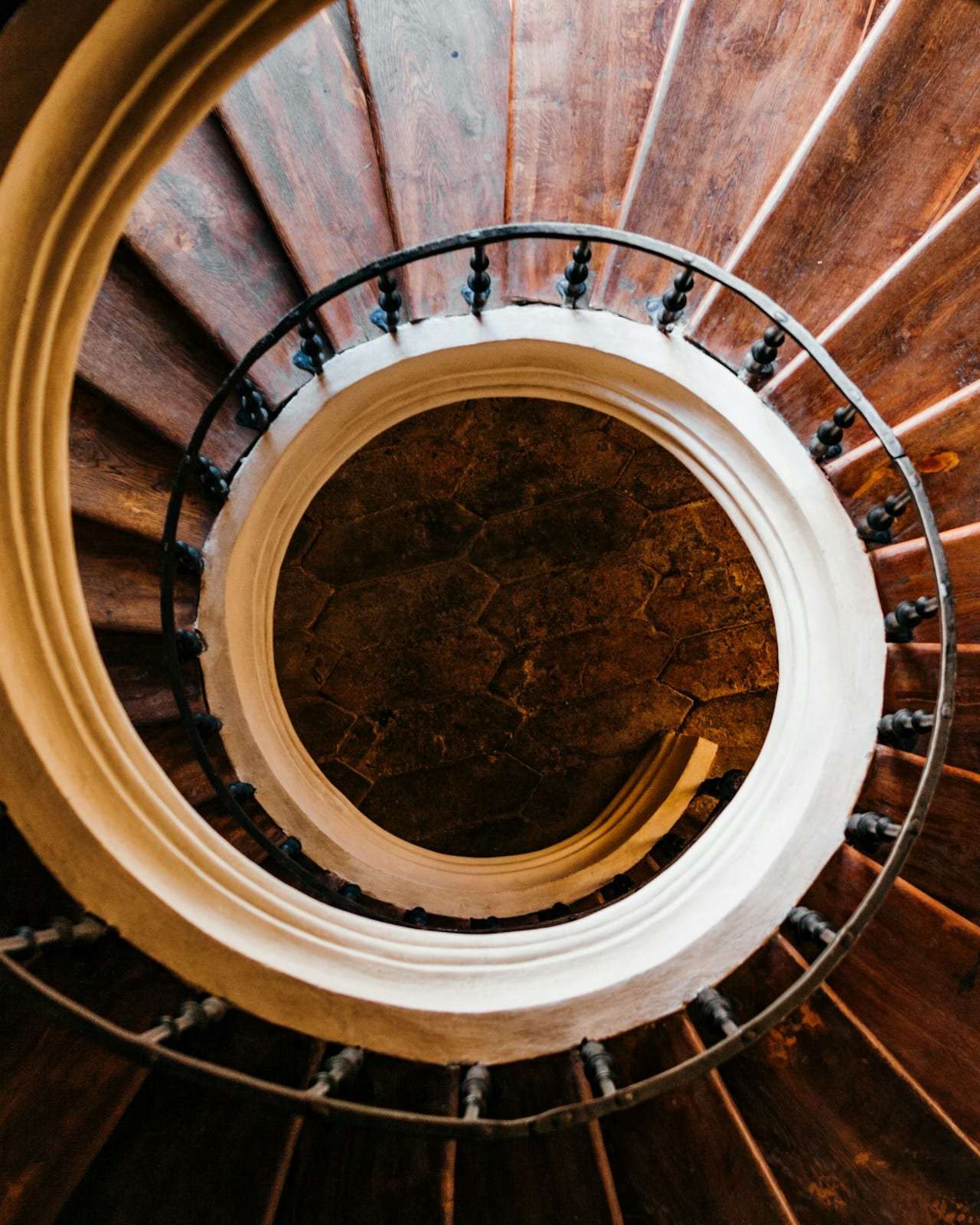 A wooden spiral staircase from above